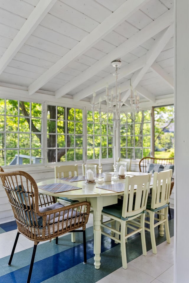74 Ottawa Ave, Portland, ME 04109 - sunroom with wood ceiling, plenty of natural light, a chandelier, and tile patterned floors
