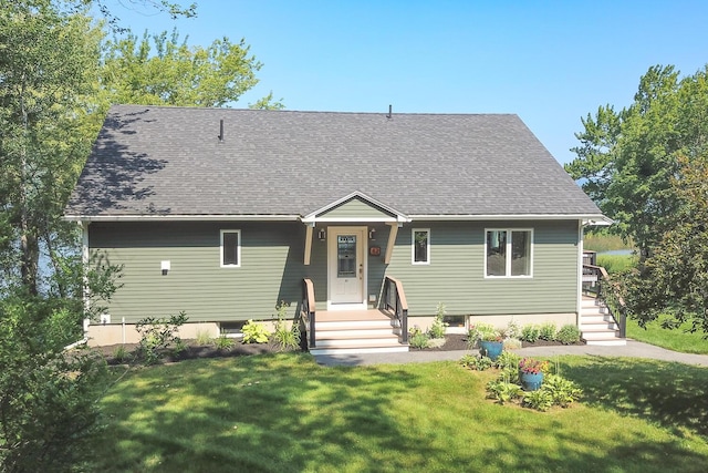 42 Barter Rd, Rockland, ME 04841 - view of front of home with a front yard and roof with shingles