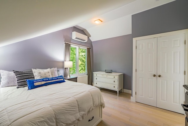 42 Barter Rd, Rockland, ME 04841 - bedroom featuring a wall mounted AC, light wood finished floors, lofted ceiling, and a closet