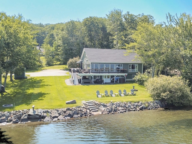 42 Barter Rd, Rockland, ME 04841 - rear view of property with a yard, a deck with water view, stairway, and a view of trees