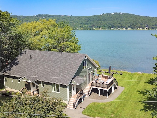 42 Barter Rd, Rockland, ME 04841 - view from above of property featuring a heavily wooded area and a nearby body of water