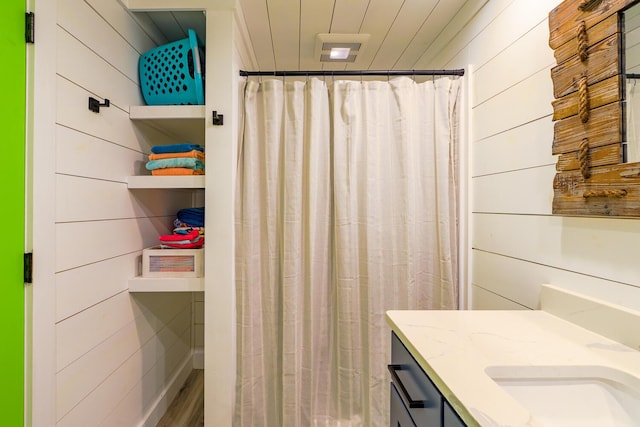 42 Barter Rd, Rockland, ME 04841 - full bath with vanity, wood walls, and curtained shower