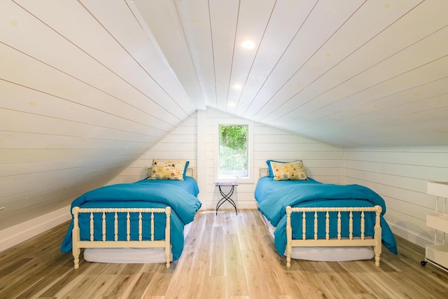 42 Barter Rd, Rockland, ME 04841 - bedroom featuring lofted ceiling, wood finished floors, and wood walls