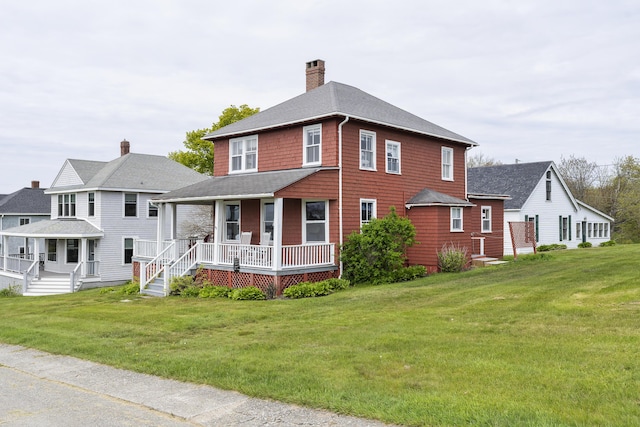 10 S Colony Branch Rd, Harpswell, ME 04079 - view of front of house with a porch, a chimney, a front yard, and a shingled roof