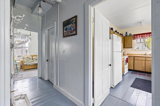 10 S Colony Branch Rd, Harpswell, ME 04079 - hall featuring a sink and wood finished floors