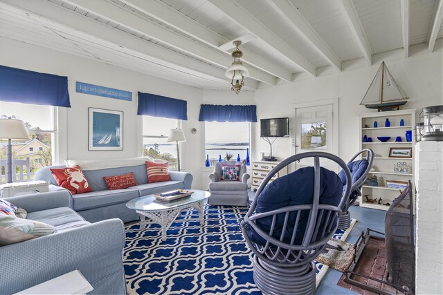 10 S Colony Branch Rd, Harpswell, ME 04079 - living area featuring plenty of natural light and beamed ceiling