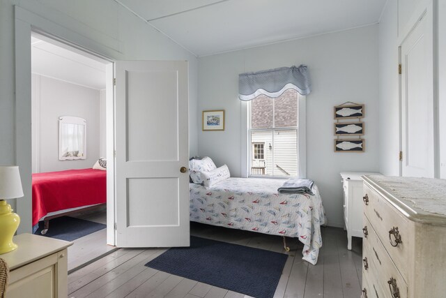 10 S Colony Branch Rd, Harpswell, ME 04079 - bedroom featuring hardwood / wood-style floors and vaulted ceiling