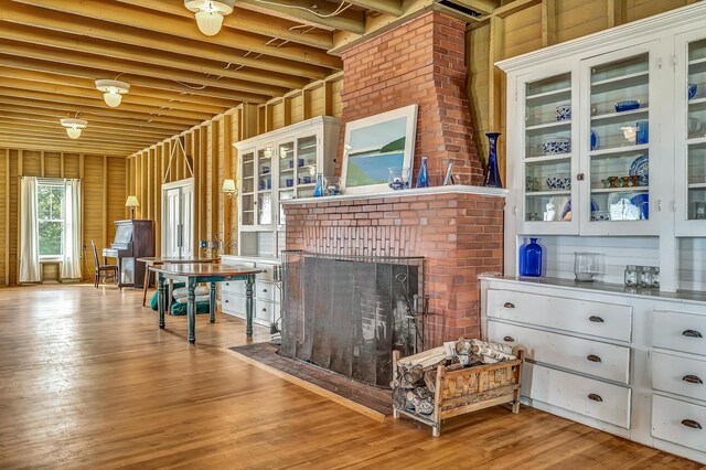 10 S Colony Branch Rd, Harpswell, ME 04079 - living area featuring wood finished floors and a fireplace