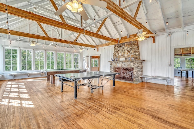 10 S Colony Branch Rd, Harpswell, ME 04079 - playroom with ceiling fan, high vaulted ceiling, light wood-style flooring, a stone fireplace, and billiards table