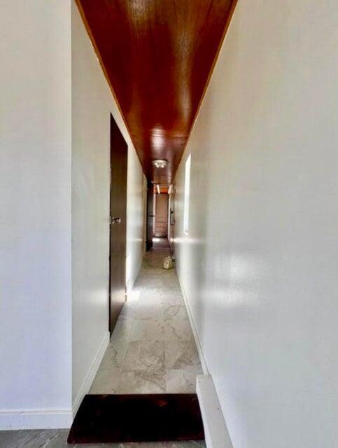 105 Arthur Allen Rd, Sumner, ME 04292 - hallway with baseboards