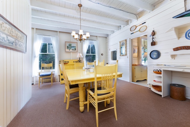 51 W Marginal Rd, Brunswick, ME 04011 - dining room with carpet, a chandelier, wooden walls, and a wooden ceiling with exposed beams
