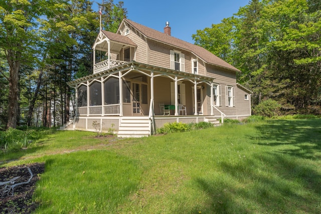51 W Marginal Rd, Brunswick, ME 04011 - view of front of home featuring a balcony, a porch, a chimney, and a front yard