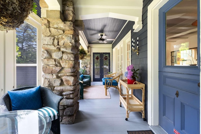 33 Rocky Ln, Ogunquit, ME 03907 - entrance to property featuring french doors, a ceiling fan, a porch, and stone siding