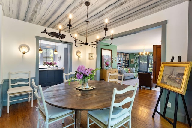 33 Rocky Ln, Ogunquit, ME 03907 - dining space with a chandelier, plenty of natural light, and wood finished floors