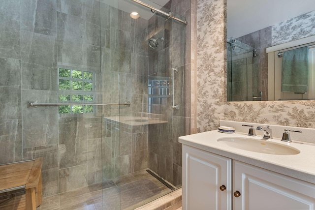 33 Rocky Ln, Ogunquit, ME 03907 - full bathroom featuring vanity, a stall shower, and wallpapered walls