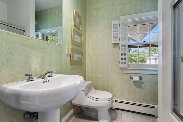 33 Rocky Ln, Ogunquit, ME 03907 - bathroom featuring a baseboard heating unit and tile patterned flooring