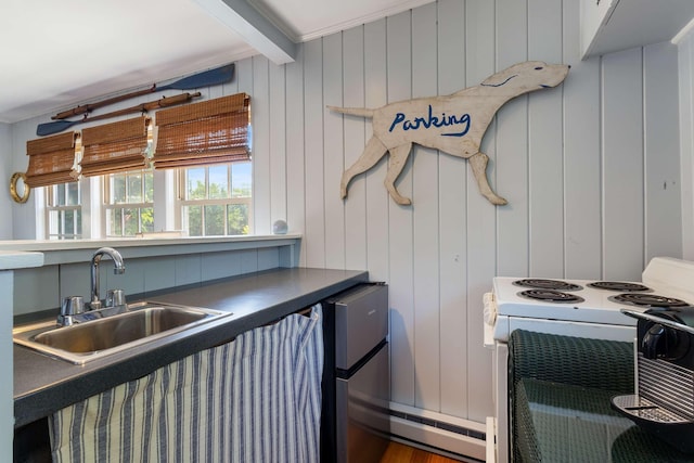 33 Rocky Ln, Ogunquit, ME 03907 - kitchen with white range with electric stovetop, beam ceiling, and dark countertops