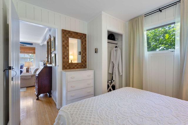 33 Rocky Ln, Ogunquit, ME 03907 - bedroom with light wood-style flooring and ornamental molding