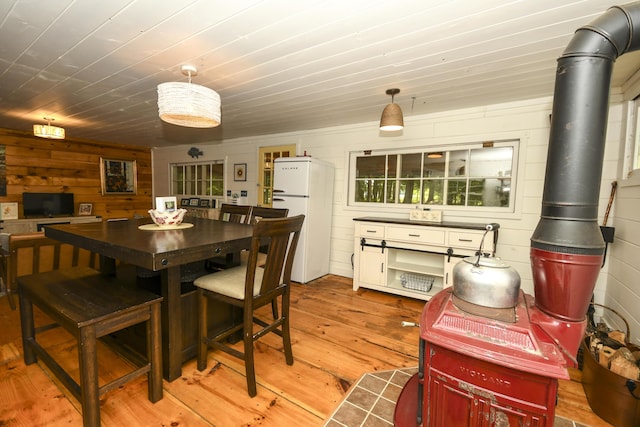 7 Cluff Ln, Bridgton, ME 04009 - dining area with hardwood / wood-style flooring and wooden walls