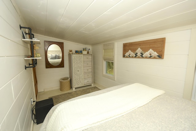 7 Cluff Ln, Bridgton, ME 04009 - bedroom with vaulted ceiling and wood walls