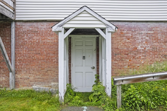85 Friendship Rd, Waldoboro, ME 04572 - doorway to property featuring brick siding
