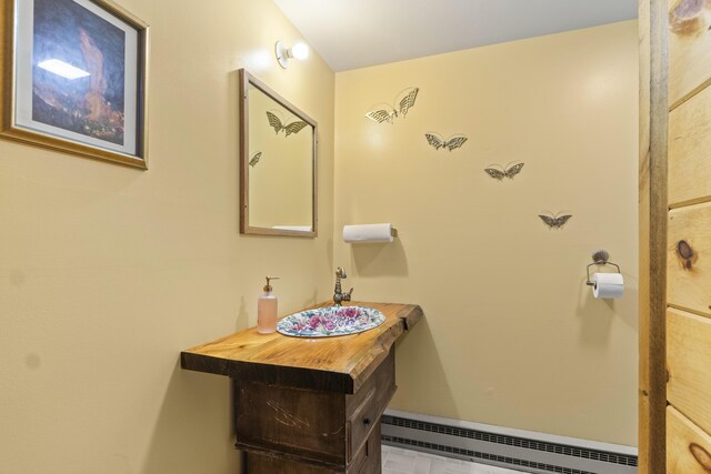 85 Friendship Rd, Waldoboro, ME 04572 - bathroom featuring a baseboard radiator and a sink