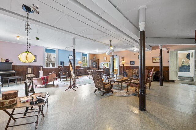 85 Friendship Rd, Waldoboro, ME 04572 - living room with wooden walls, a wainscoted wall, and tile patterned floors