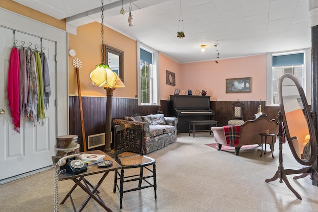 85 Friendship Rd, Waldoboro, ME 04572 - living room with wainscoting, wood walls, carpet, and crown molding