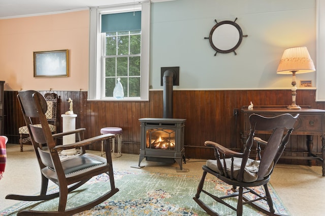 85 Friendship Rd, Waldoboro, ME 04572 - sitting room with a wood stove, wainscoting, and wooden walls