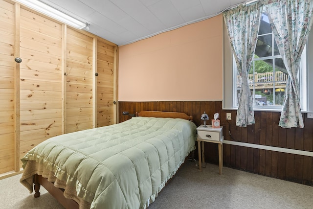 85 Friendship Rd, Waldoboro, ME 04572 - bedroom with carpet flooring, wooden walls, and wainscoting