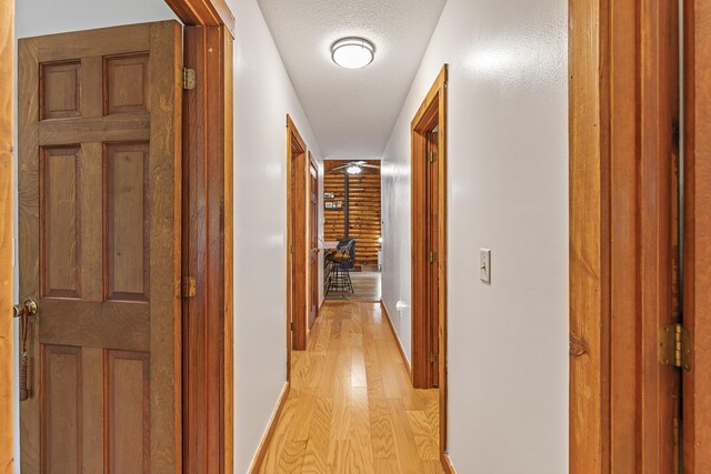 509 Upper Guinea Rd, Lebanon, ME 04027 - hallway with light wood finished floors and baseboards