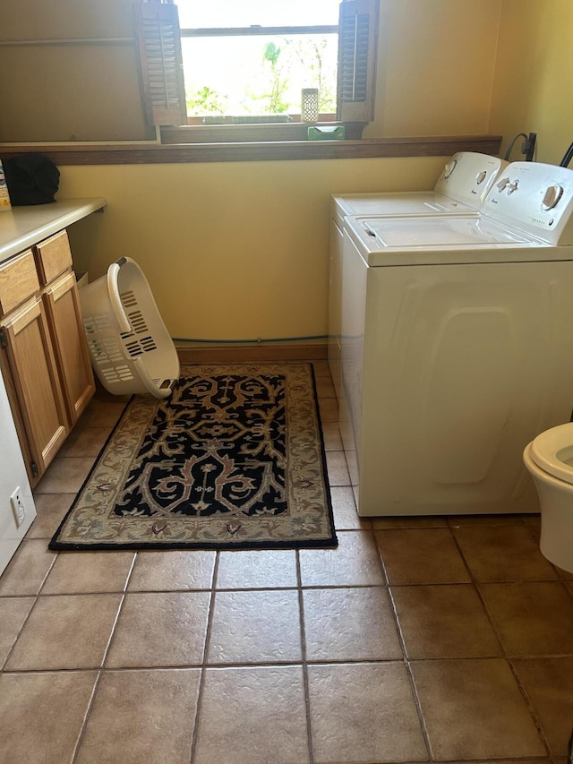 8 Camp Rd, Hartford, ME 04220 - laundry room featuring washer and clothes dryer and light tile patterned floors