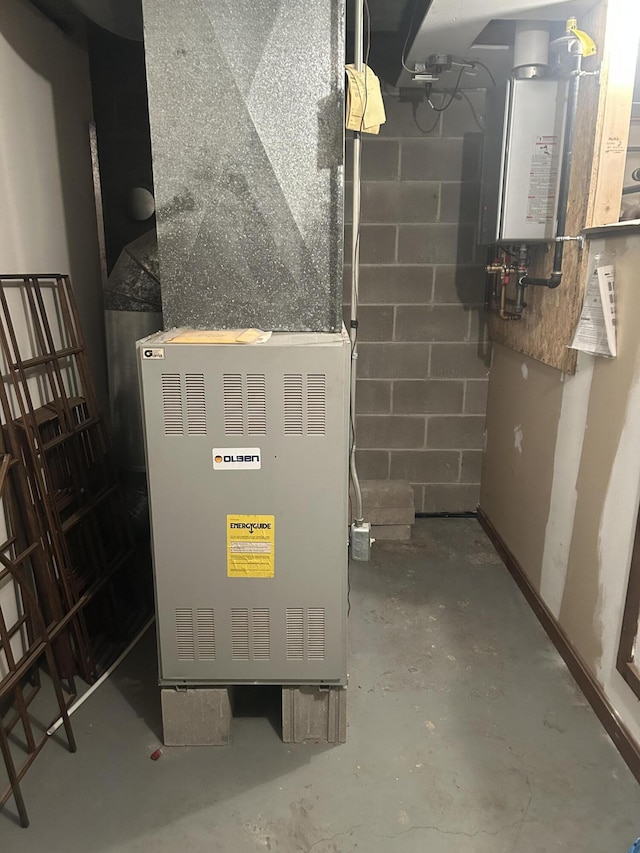 8 Camp Rd, Hartford, ME 04220 - utility room with tankless water heater and heating unit