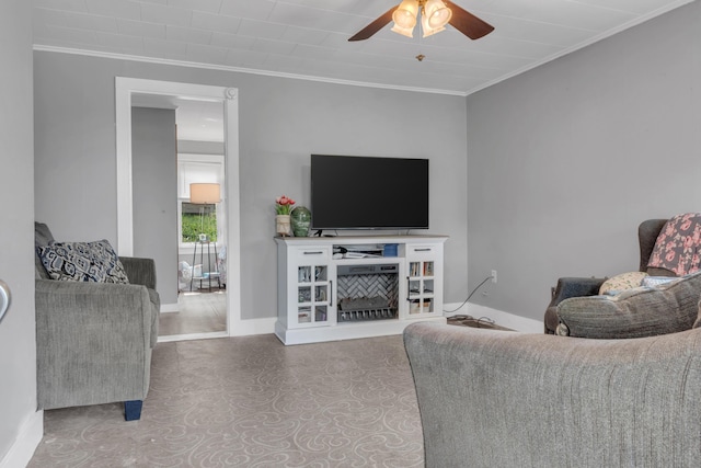 133 Middlesex Rd, Topsham, ME 04086 - living area featuring a ceiling fan, crown molding, and baseboards