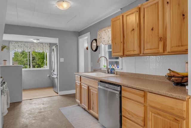 133 Middlesex Rd, Topsham, ME 04086 - kitchen with stainless steel appliances, a sink, concrete flooring, light countertops, and light brown cabinetry