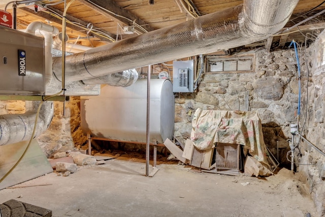 133 Middlesex Rd, Topsham, ME 04086 - unfinished basement featuring oil tank and electric panel