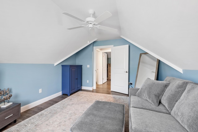 46 Patriot Way Unit 135, Arundel, ME 04046 - living room featuring wood finished floors, a ceiling fan, lofted ceiling, and baseboards