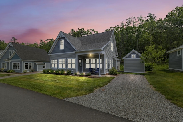 46 Patriot Way Unit 135, Arundel, ME 04046 - view of front of home with a yard, driveway, and a shingled roof