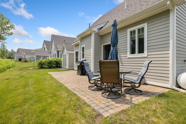 46 Patriot Way Unit 135, Arundel, ME 04046 - view of grassy yard with a patio
