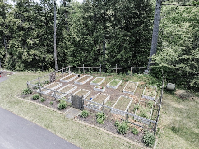 15 Brookview Dr, Bucksport, ME 04416 - view of yard featuring a garden and a wooded view