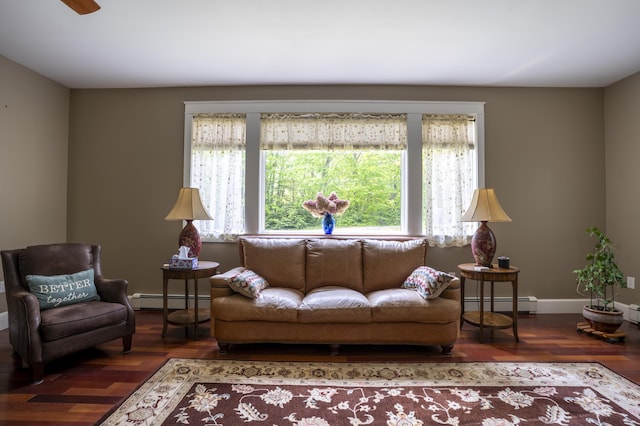 15 Brookview Dr, Bucksport, ME 04416 - living room with a baseboard radiator, healthy amount of natural light, and wood finished floors