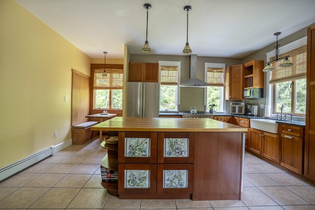 15 Brookview Dr, Bucksport, ME 04416 - kitchen with wall chimney range hood, open shelves, stainless steel appliances, and a sink