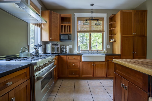 15 Brookview Dr, Bucksport, ME 04416 - kitchen with stainless steel stove, open shelves, a sink, black microwave, and wall chimney exhaust hood