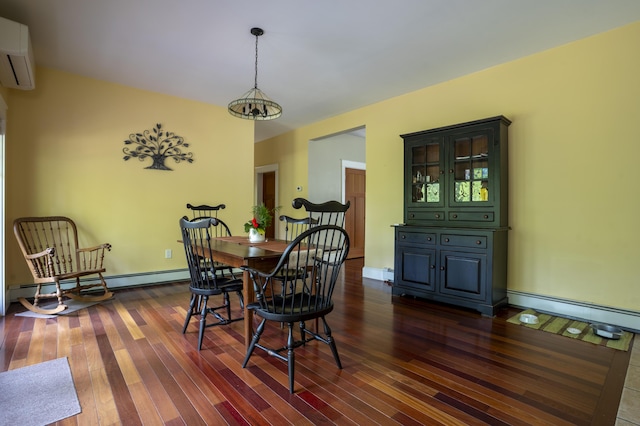 15 Brookview Dr, Bucksport, ME 04416 - dining space featuring a wall mounted air conditioner, dark wood-style floors, and baseboard heating