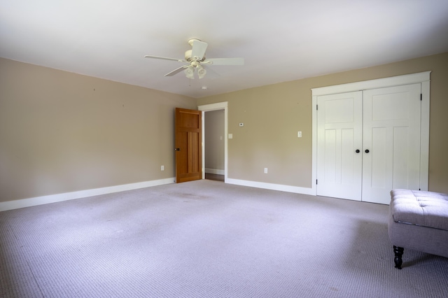 15 Brookview Dr, Bucksport, ME 04416 - unfurnished bedroom featuring baseboards, a closet, carpet floors, and a ceiling fan
