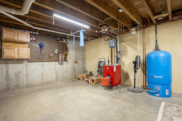 15 Brookview Dr, Bucksport, ME 04416 - unfinished basement with a water pressure tank