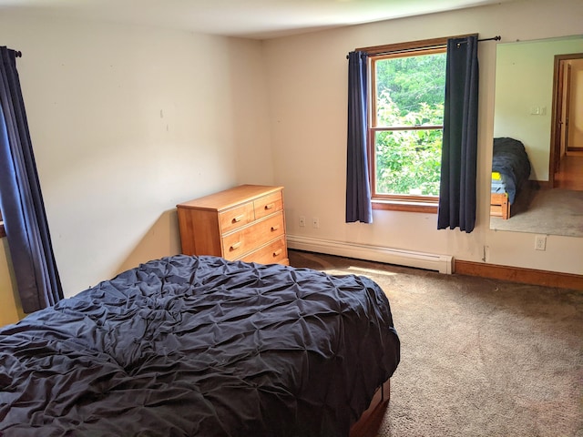 116 Point Rd, Acton, ME 04001 - bedroom featuring a baseboard heating unit and carpet flooring
