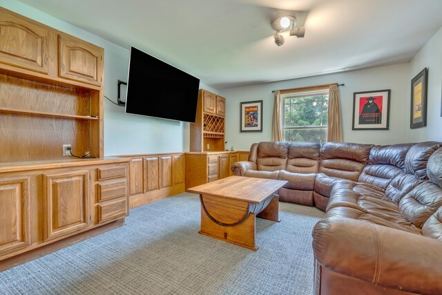 116 Point Rd, Acton, ME 04001 - living room featuring light carpet and bar