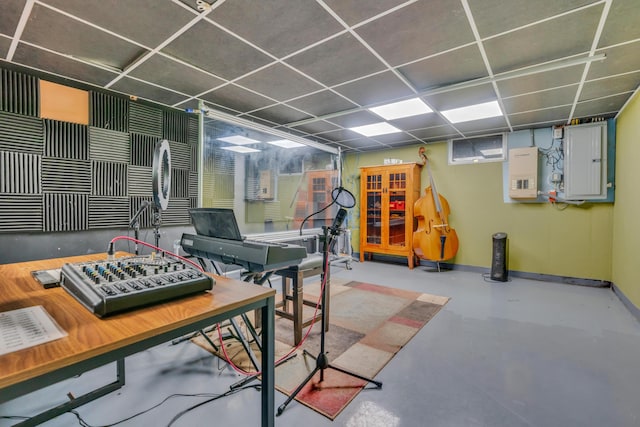 116 Point Rd, Acton, ME 04001 - rec room with electric panel, finished concrete flooring, and a paneled ceiling