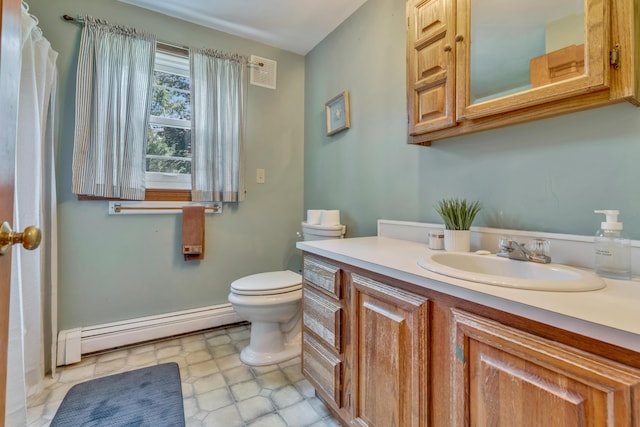 116 Point Rd, Acton, ME 04001 - bathroom featuring a baseboard radiator and vanity